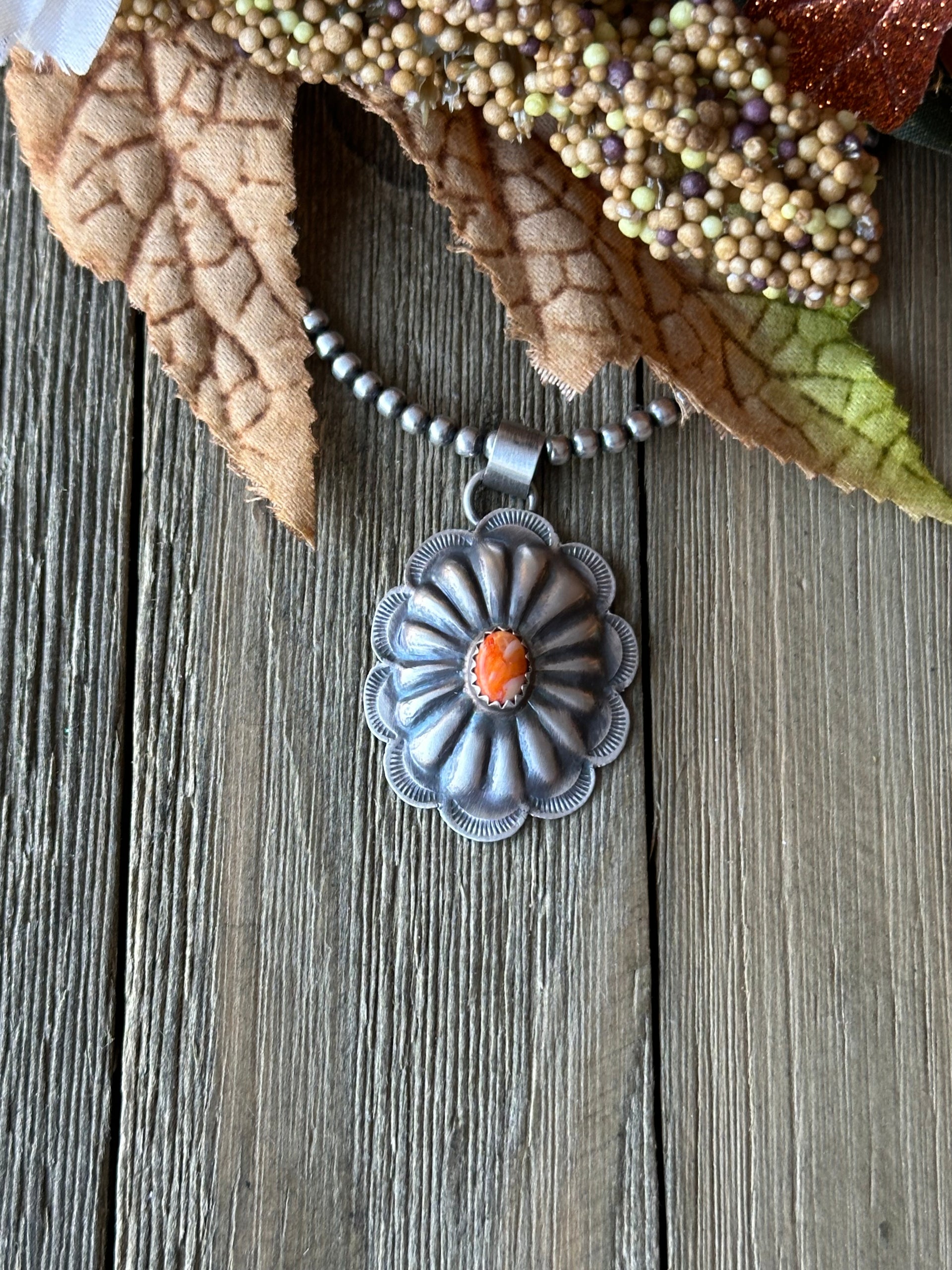 Navajo Made Spiny Oyster & Sterling Silver Concho Pendant