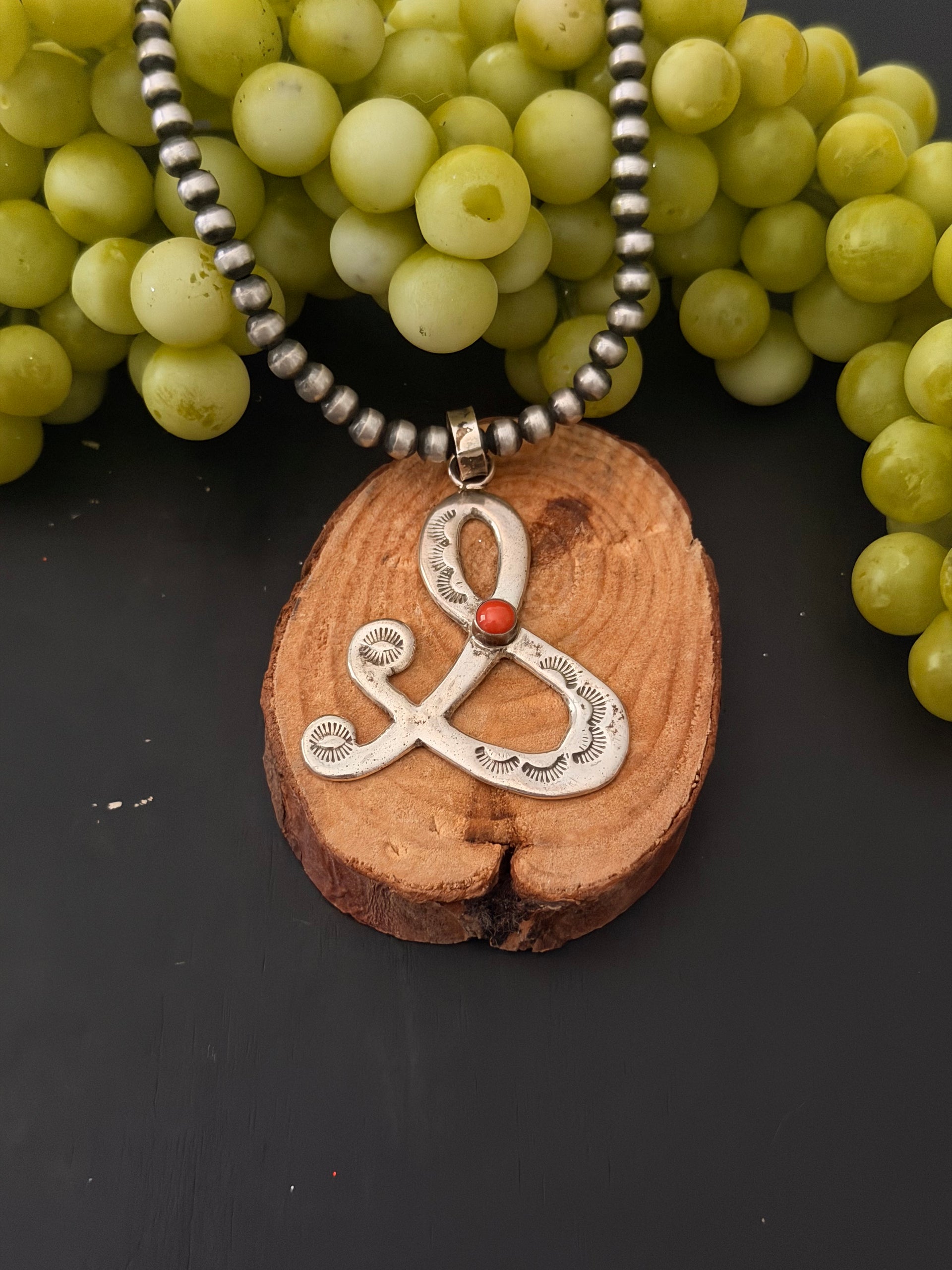 Navajo Made Coral & Sterling Silver Pendant