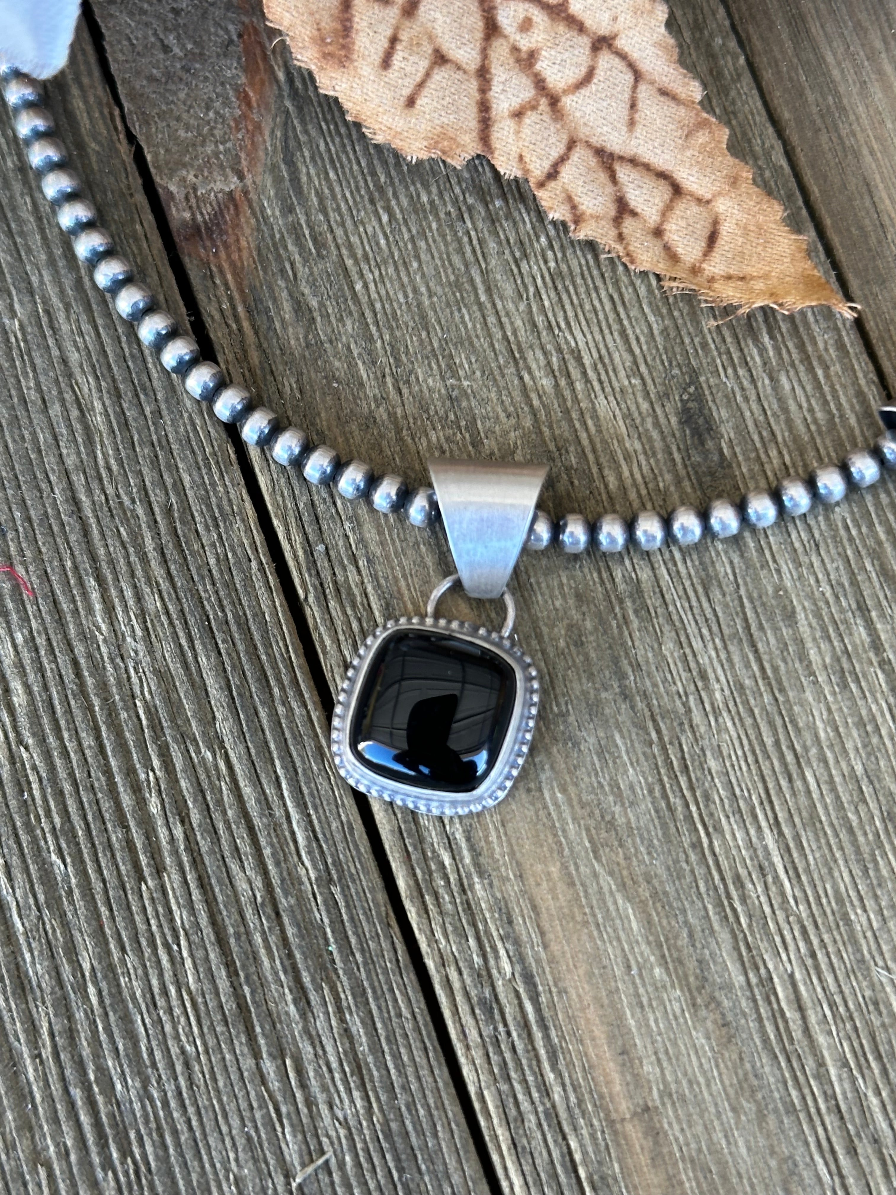 Navajo Made Onyx & Sterling Silver Pendant