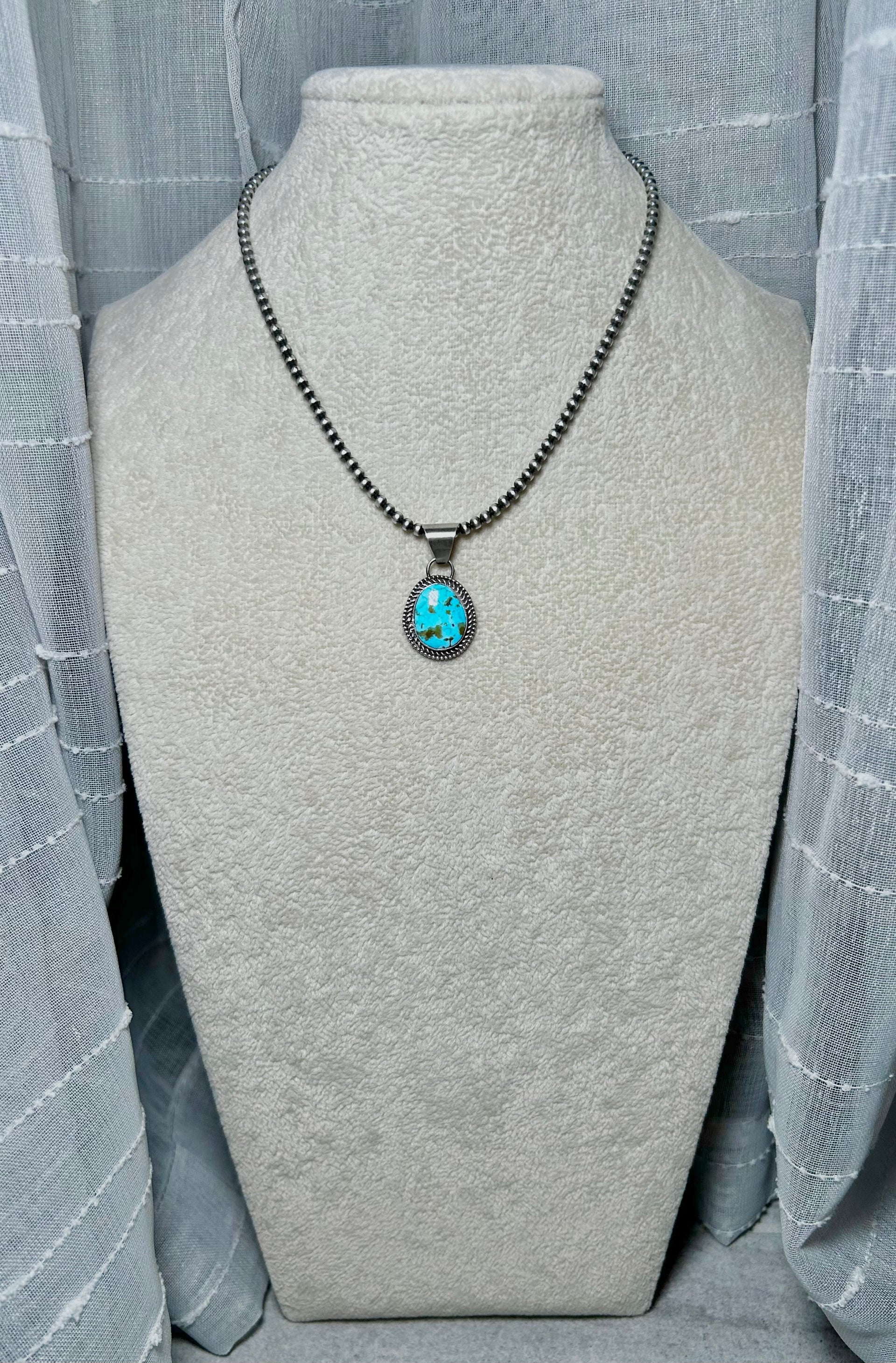 Navajo Made Birds Eye Kingman & Sterling Silver Pendant