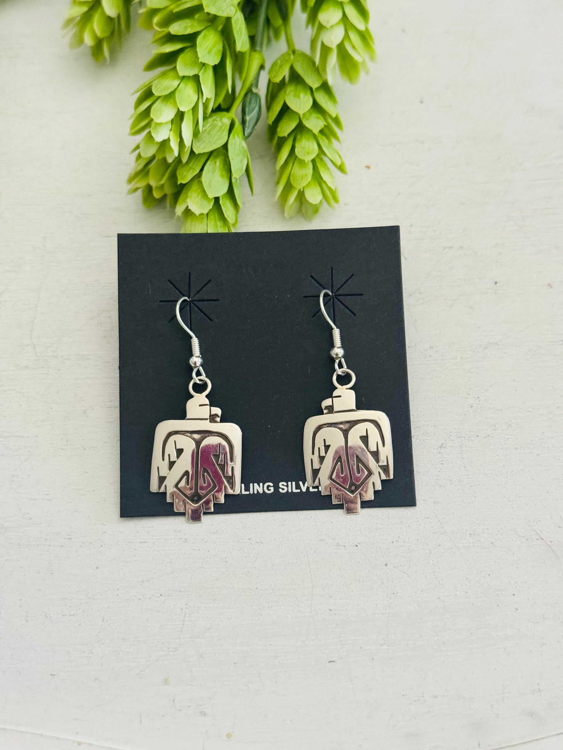 Navajo Made Sterling Silver Cast Dangle Thunderbird Earrings