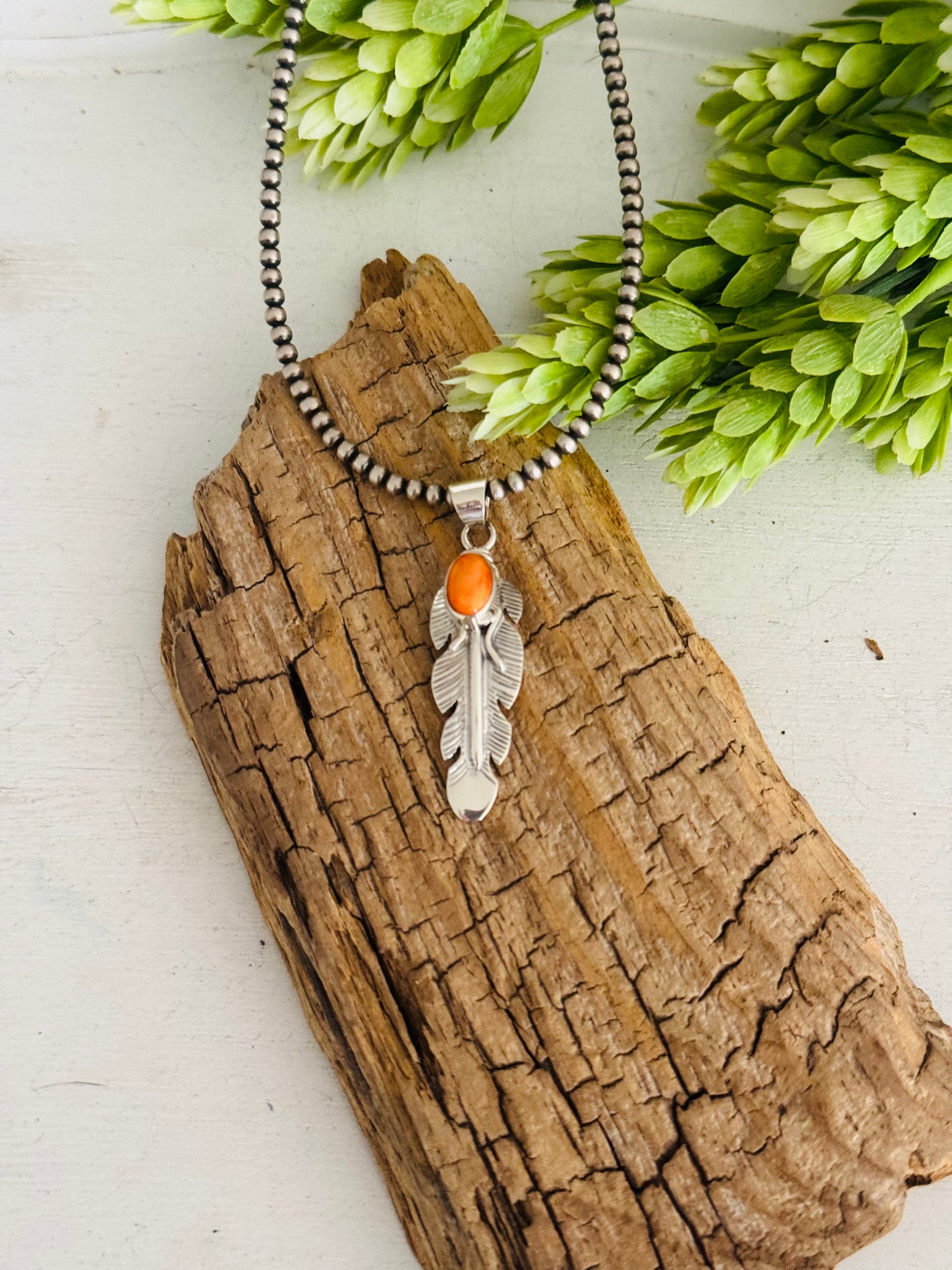 Navajo Made Spiny Oyster & Sterling Silver Feather Pendant