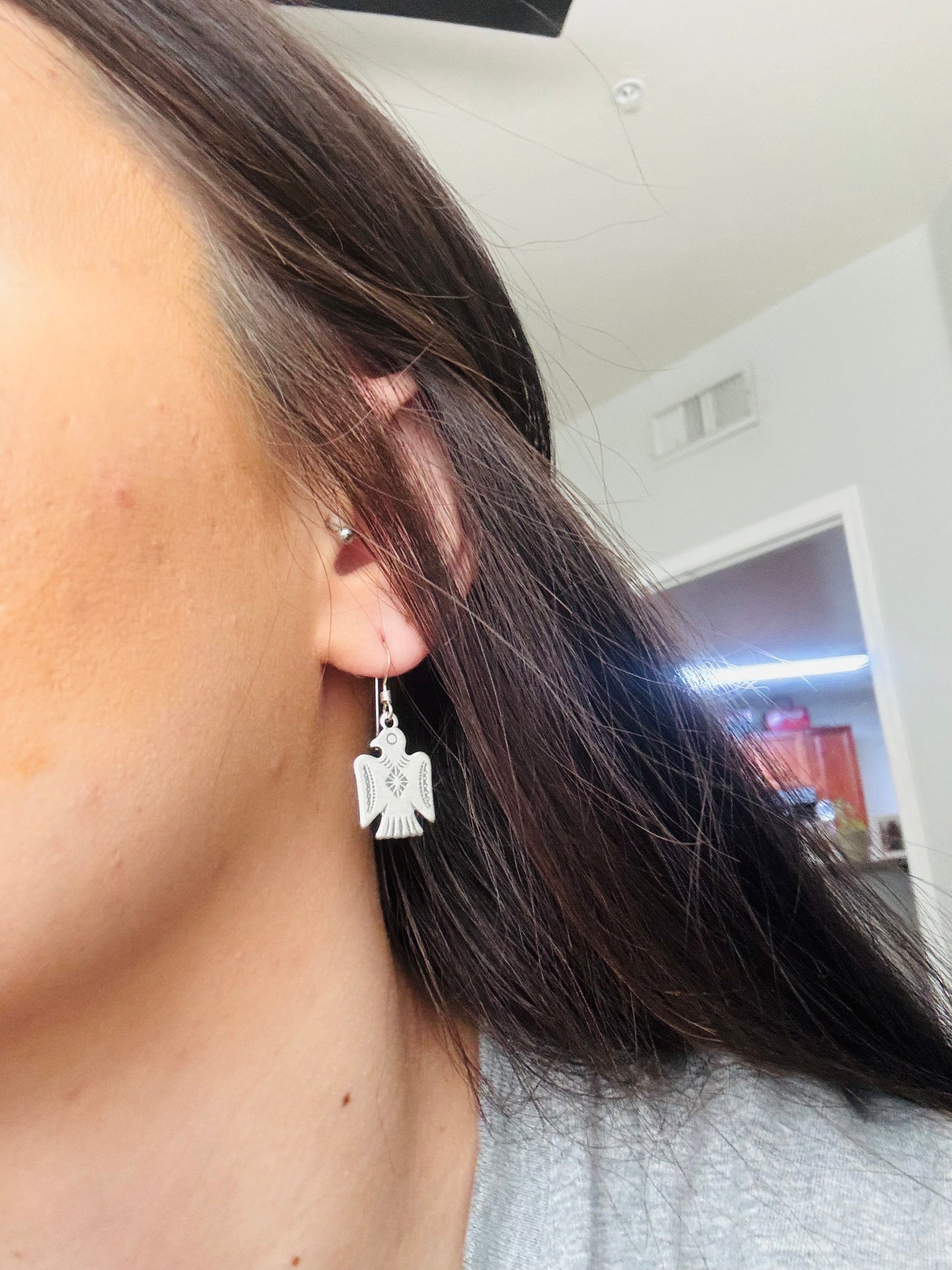 Navajo Made Sterling Silver Cast Dangle Thunderbird Earrings
