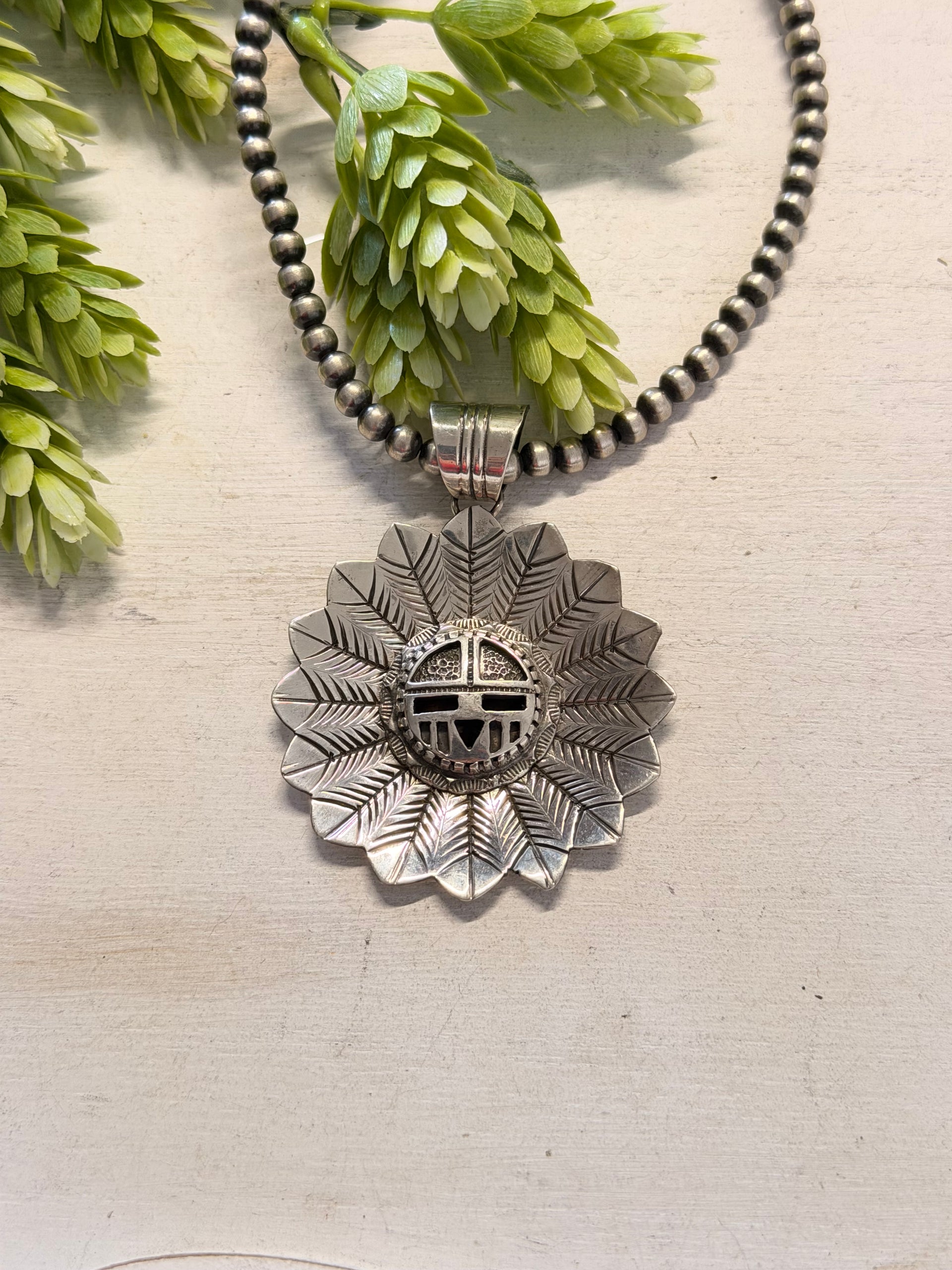 Navajo Made Sterling Silver Sunface Pendant
