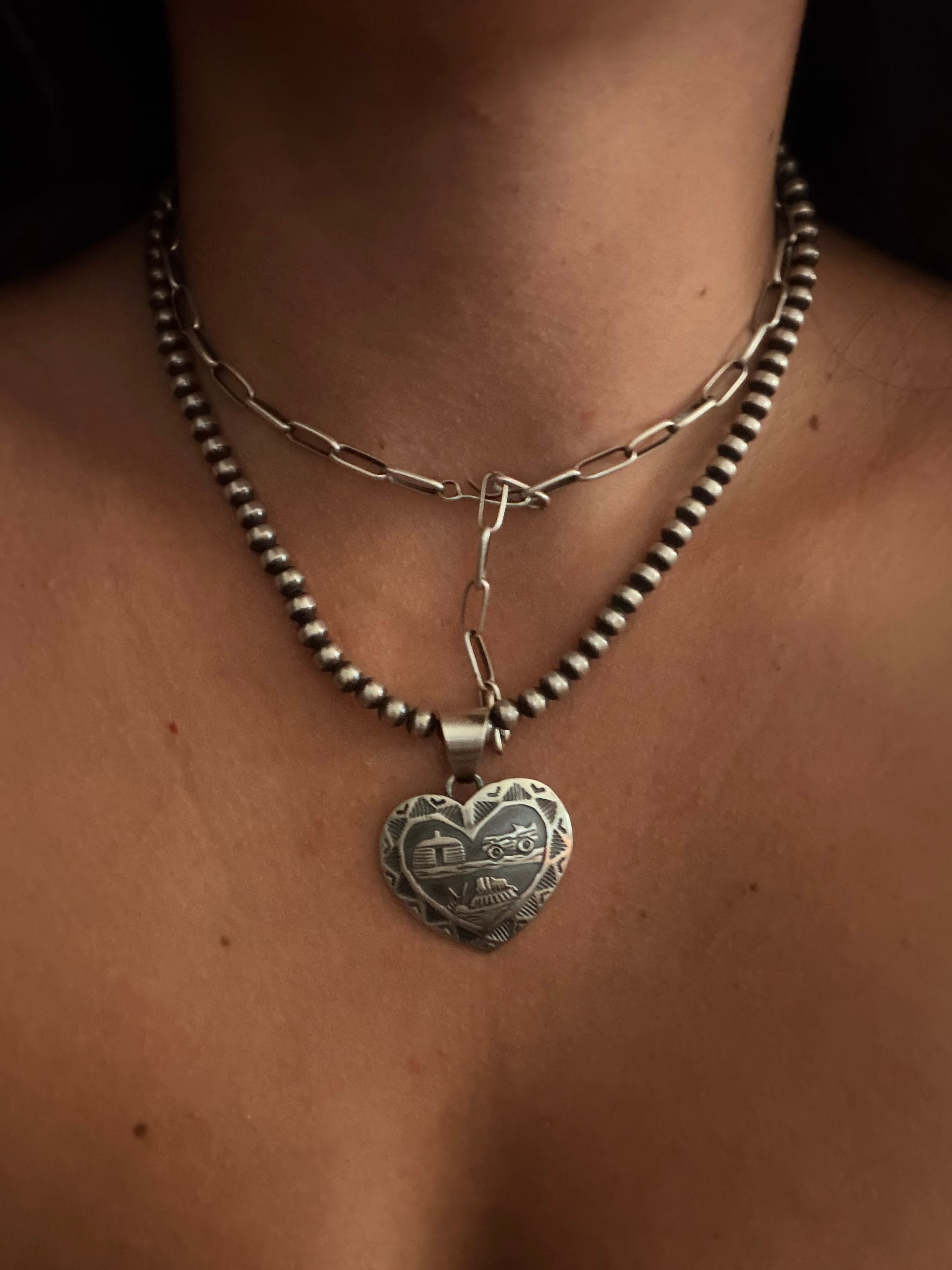 Wilson Tsosie Sterling Silver Storyteller Heart Pendants
