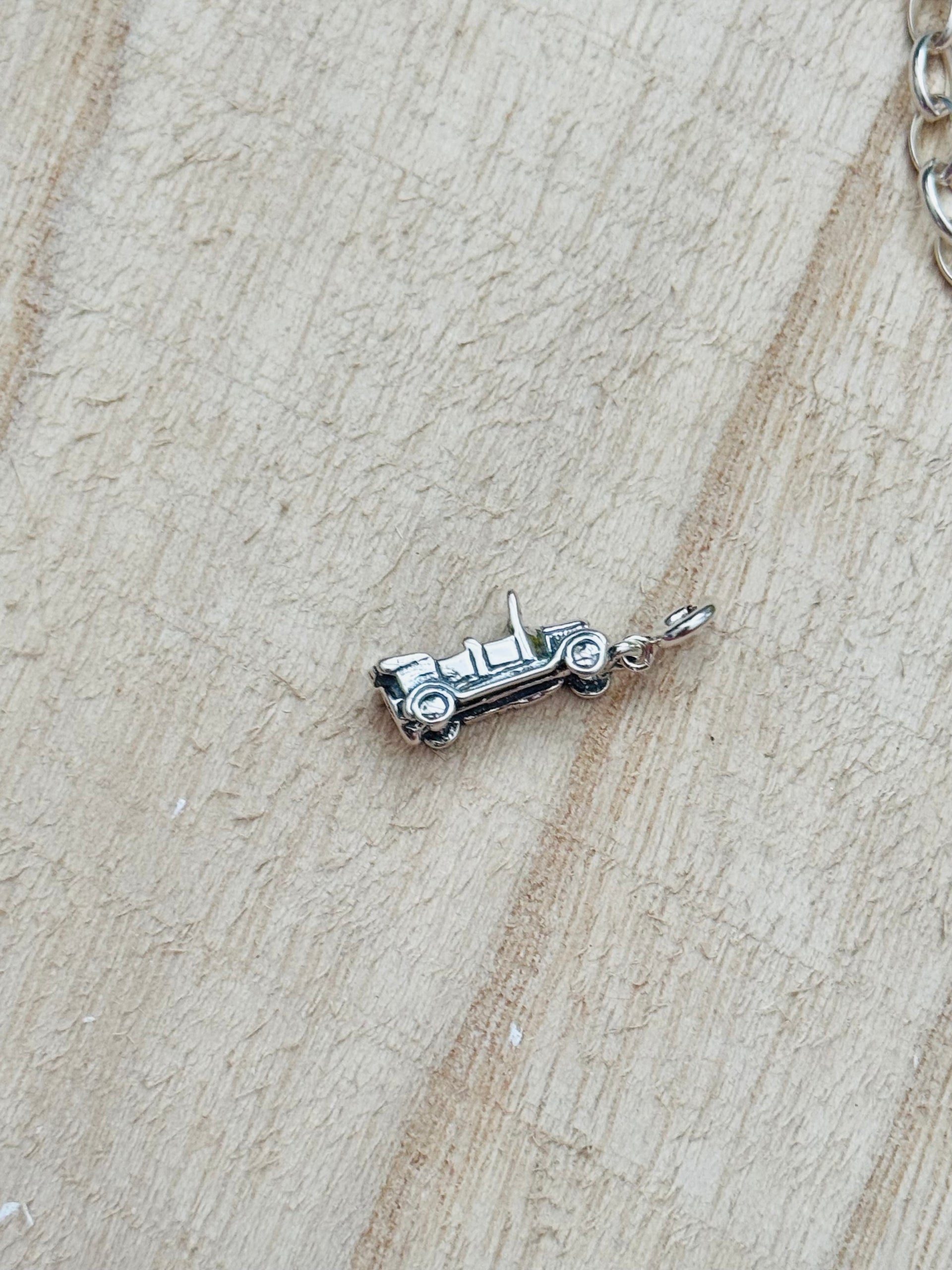 Navajo Made Sterling Silver Car Cast Charms