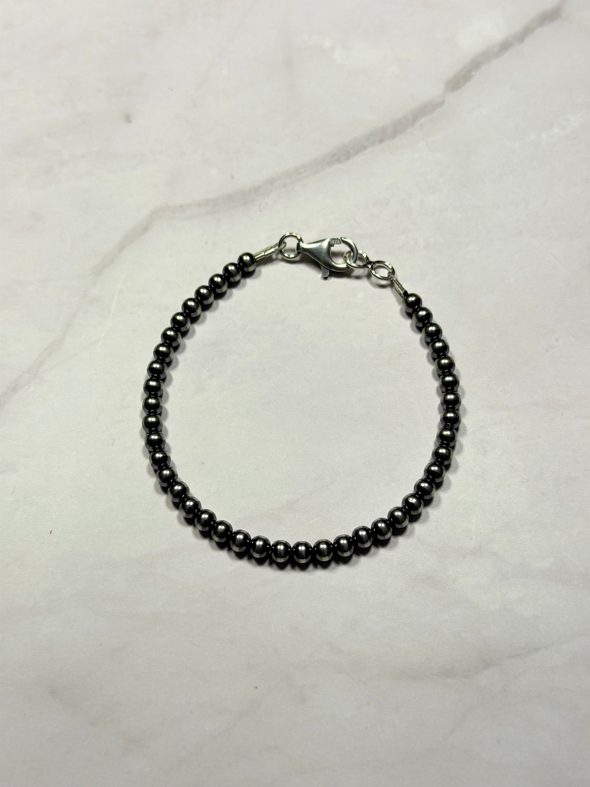 Navajo Strung 4 MM Sterling Sliver  Machine Made Pearl Bracelet