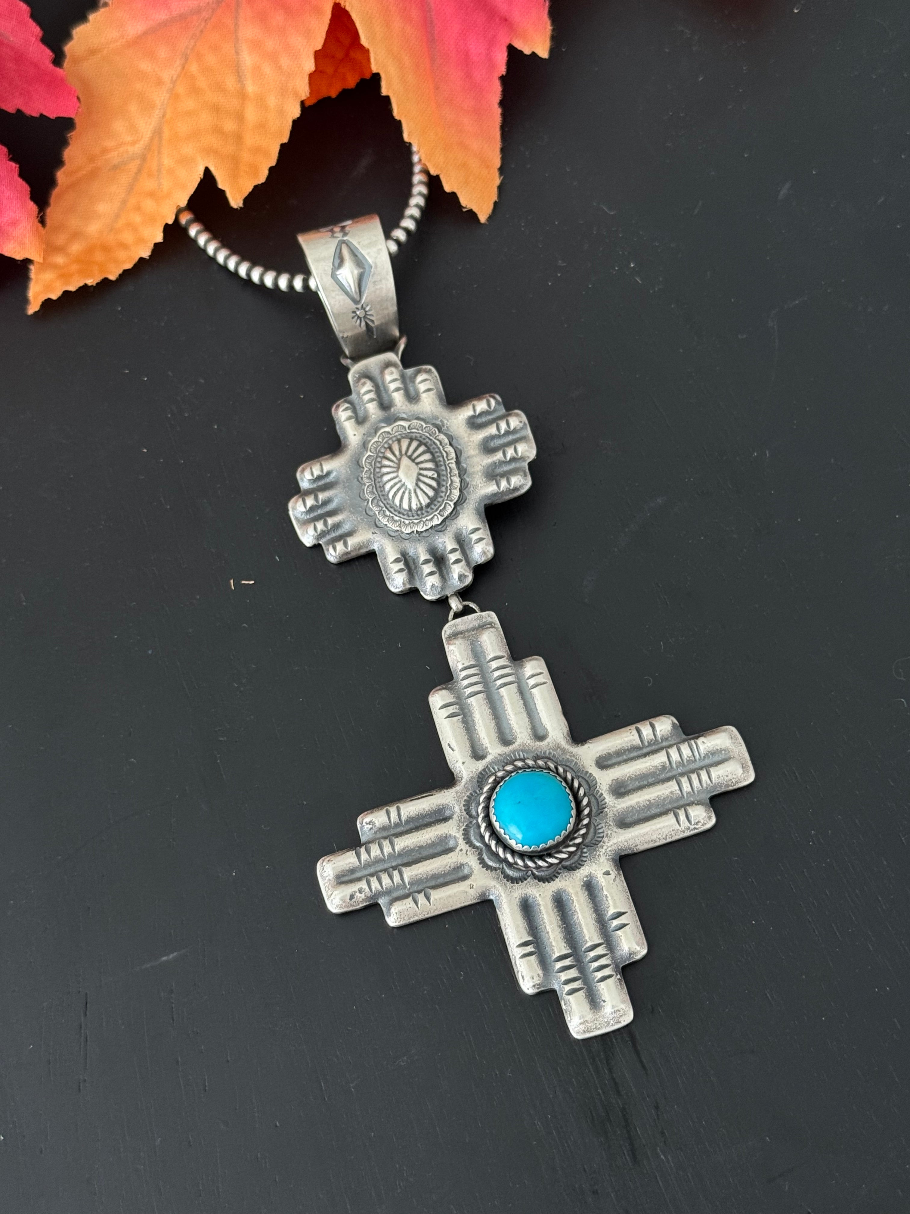 Navajo Made Kingman Turquoise & Sterling Silver Zia Pendant