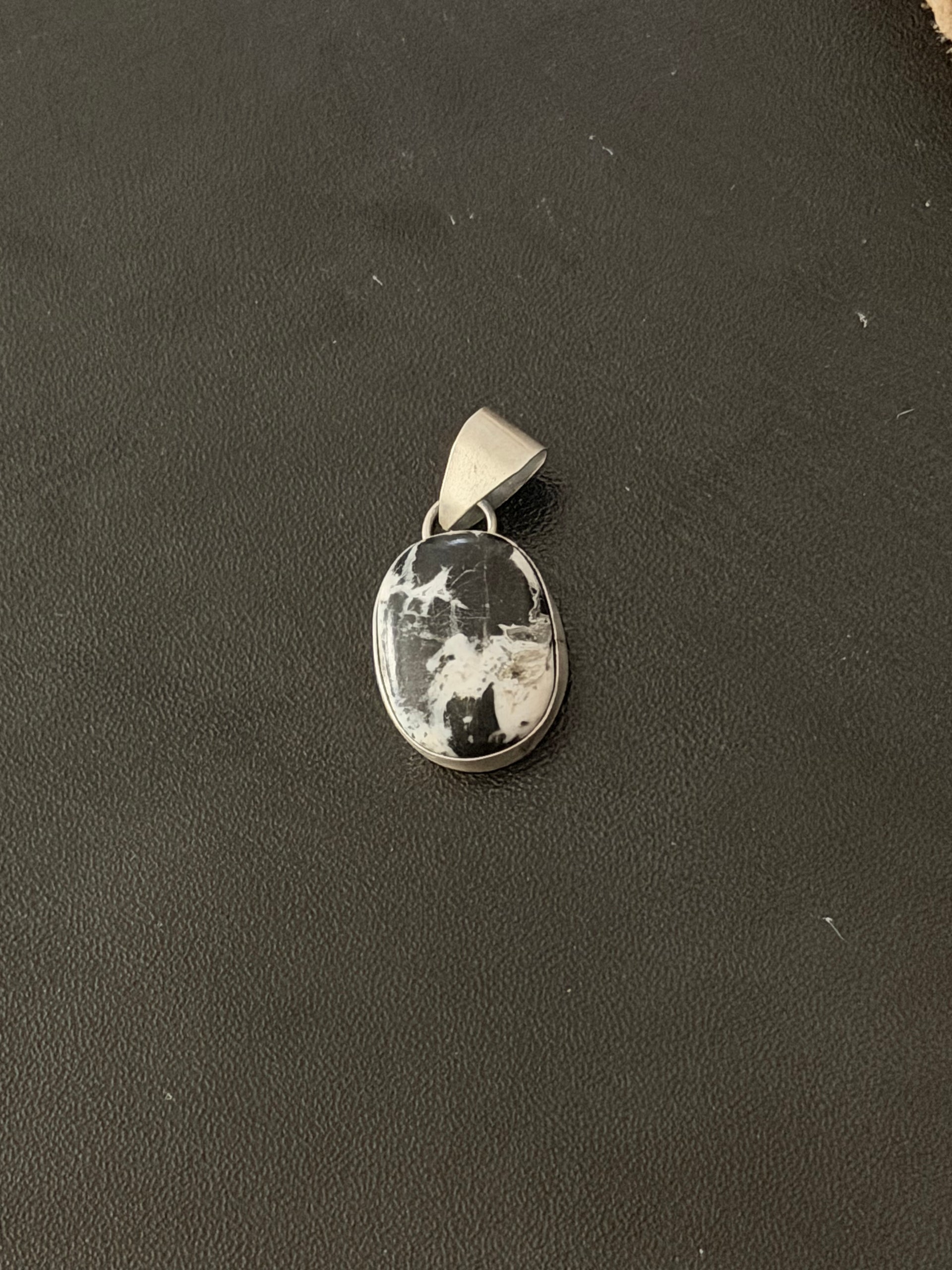 Navajo Made White Buffalo Sterling Silver Pendant