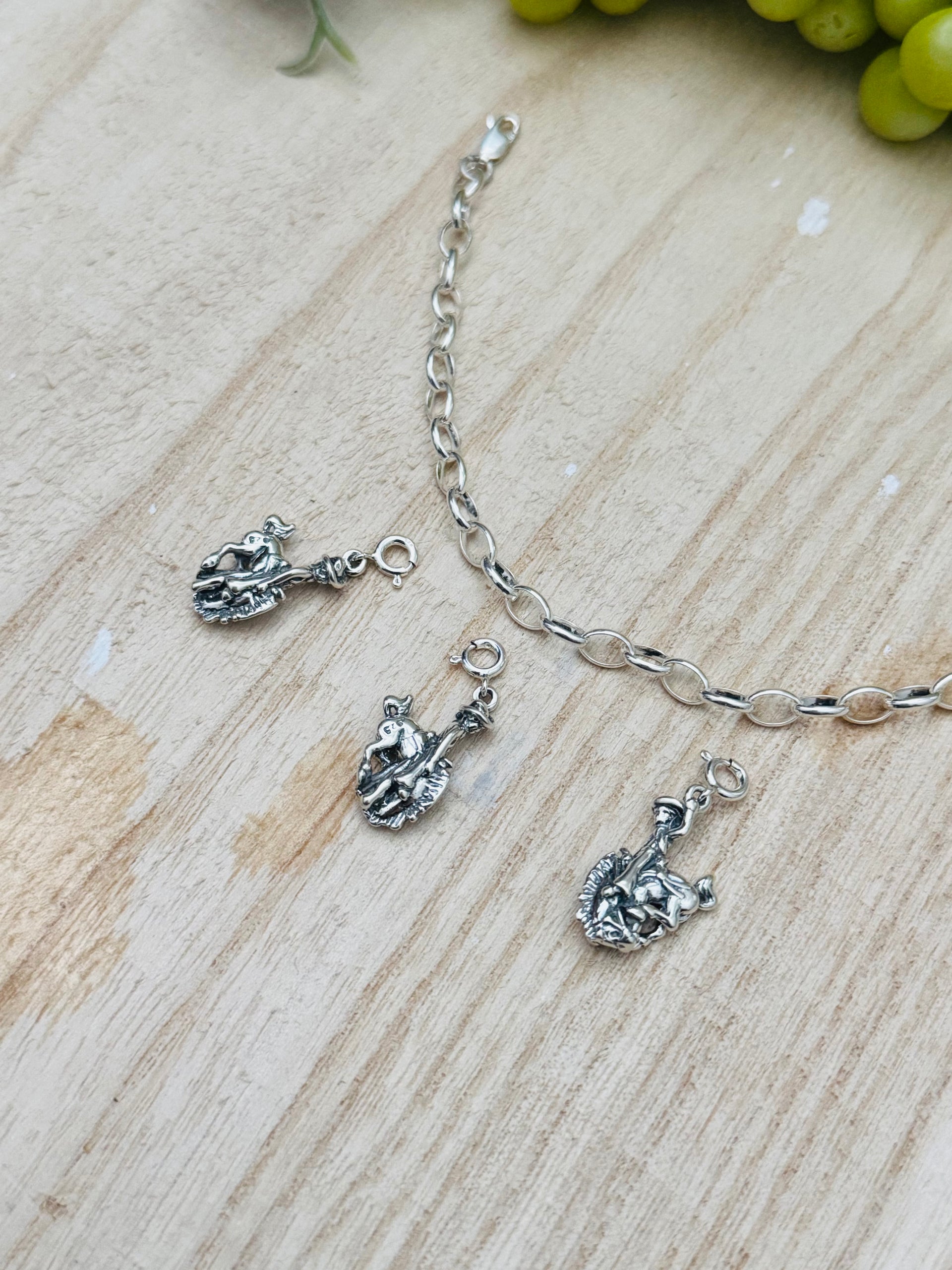 Navajo Made Sterling Silver Bucking Horse Cast Charms