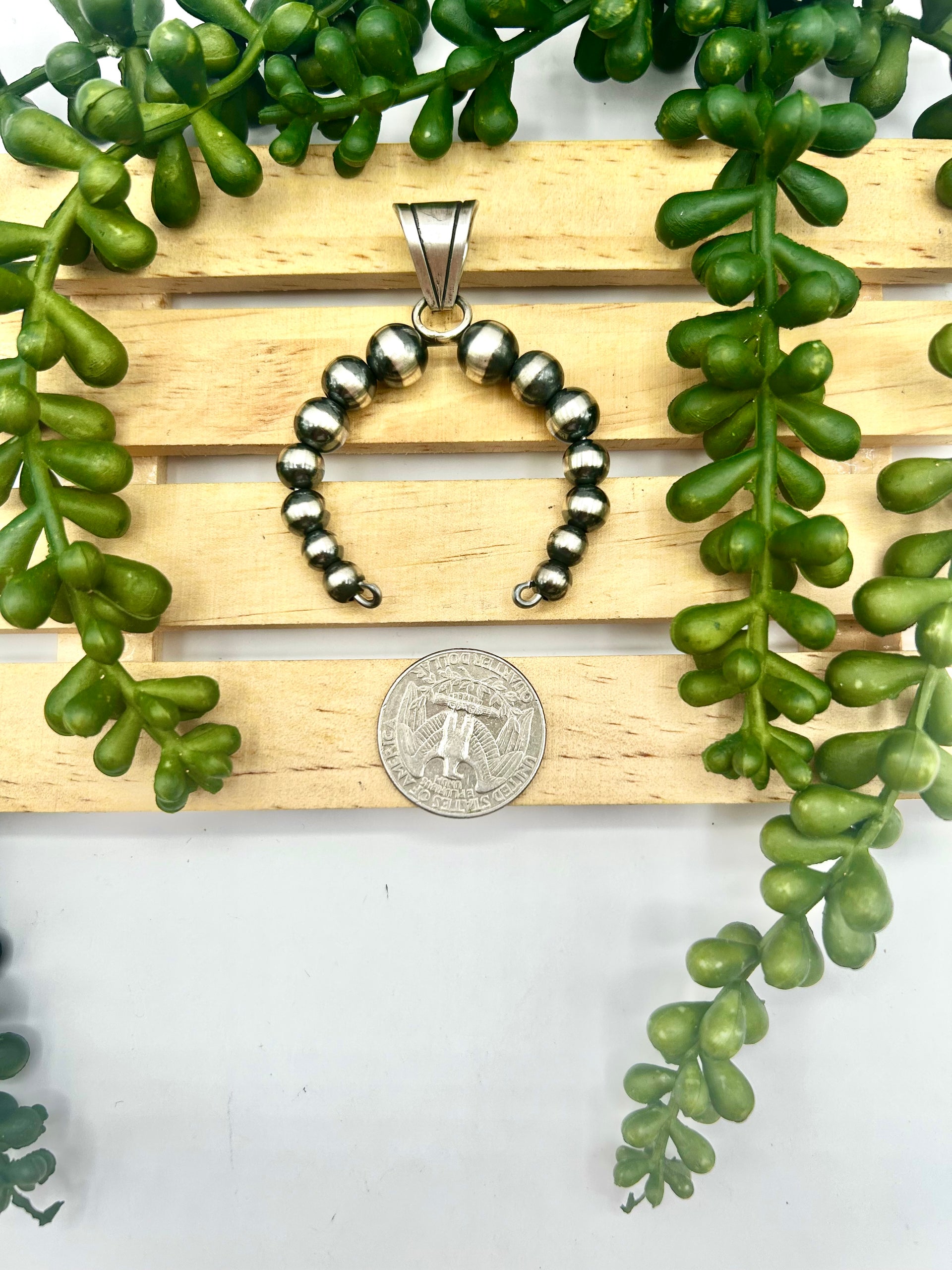 Navajo Made Strung Sterling Silver Pendant