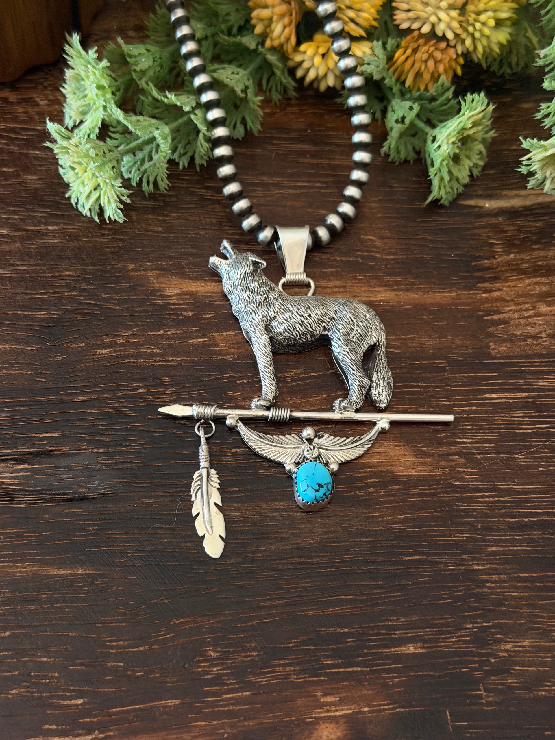 Navajo Made Kingman Turquoise & Sterling Silver Wolf Pendant