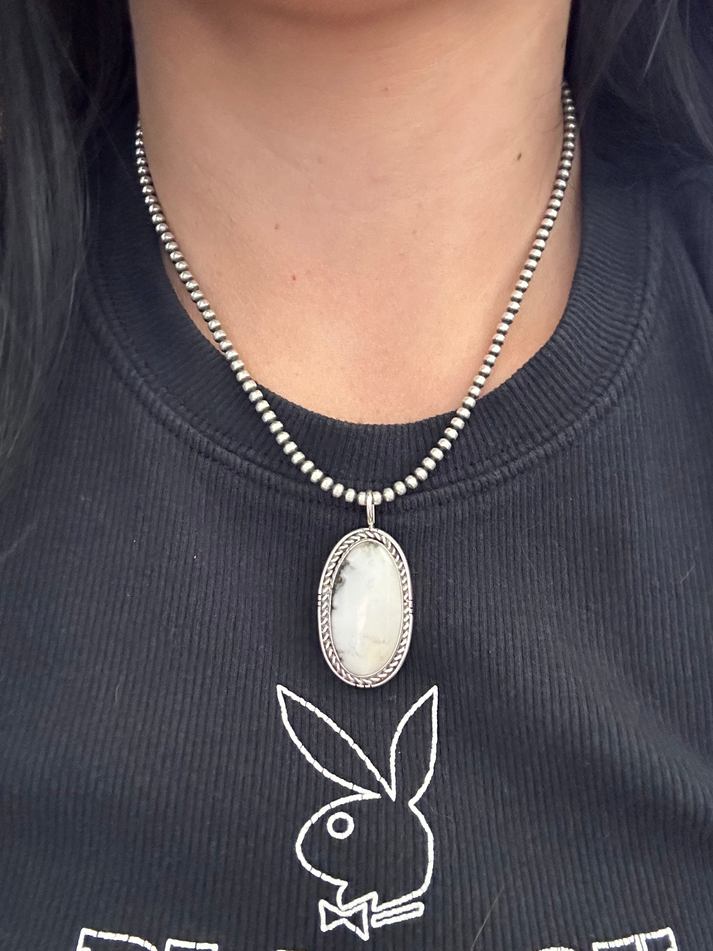 Navajo Made White Buffalo & Sterling Silver Pendant.