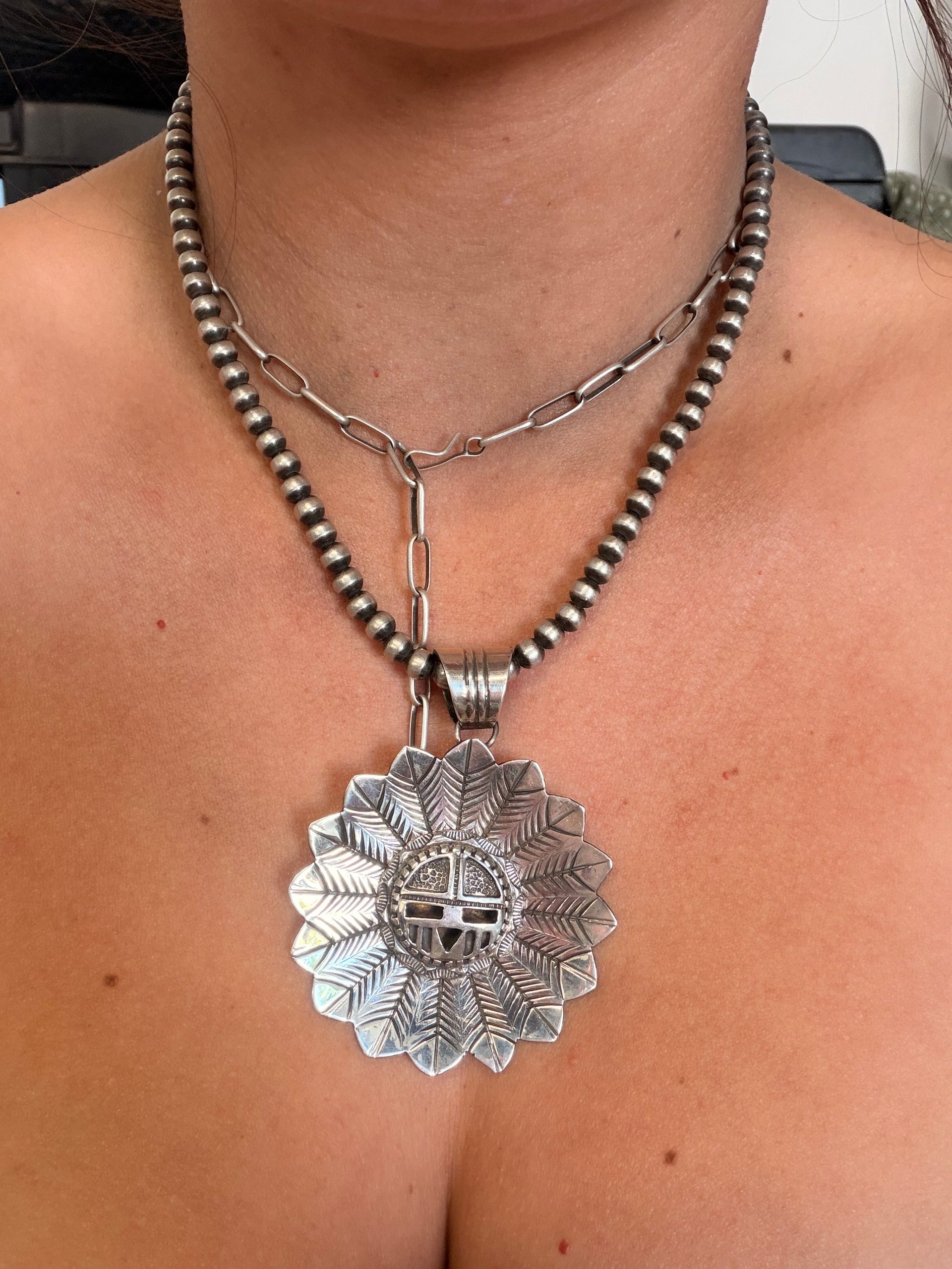 Navajo Made Sterling Silver Sunface Pendant