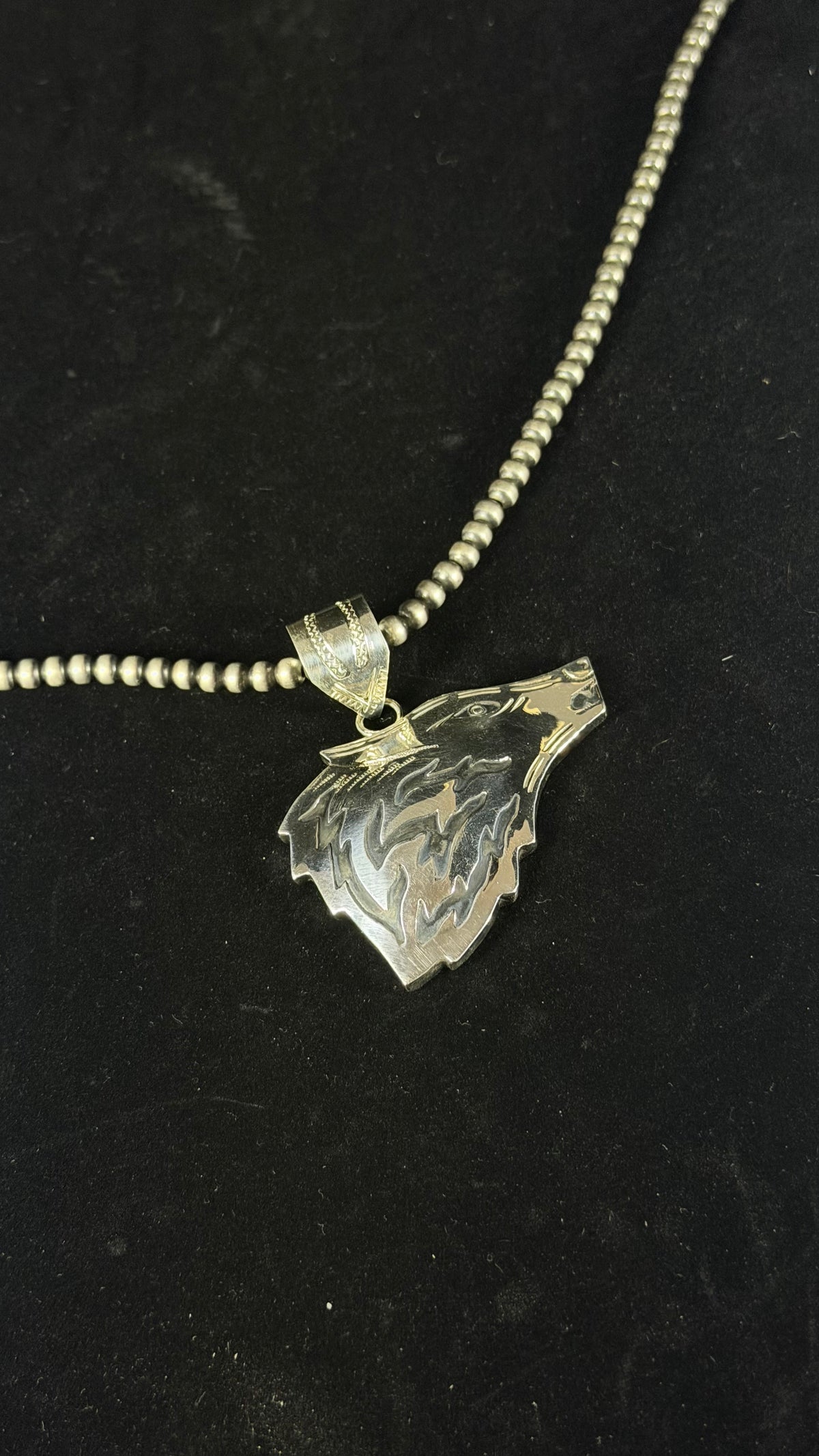 Navajo Made Sterling Silver Wolf Pendant