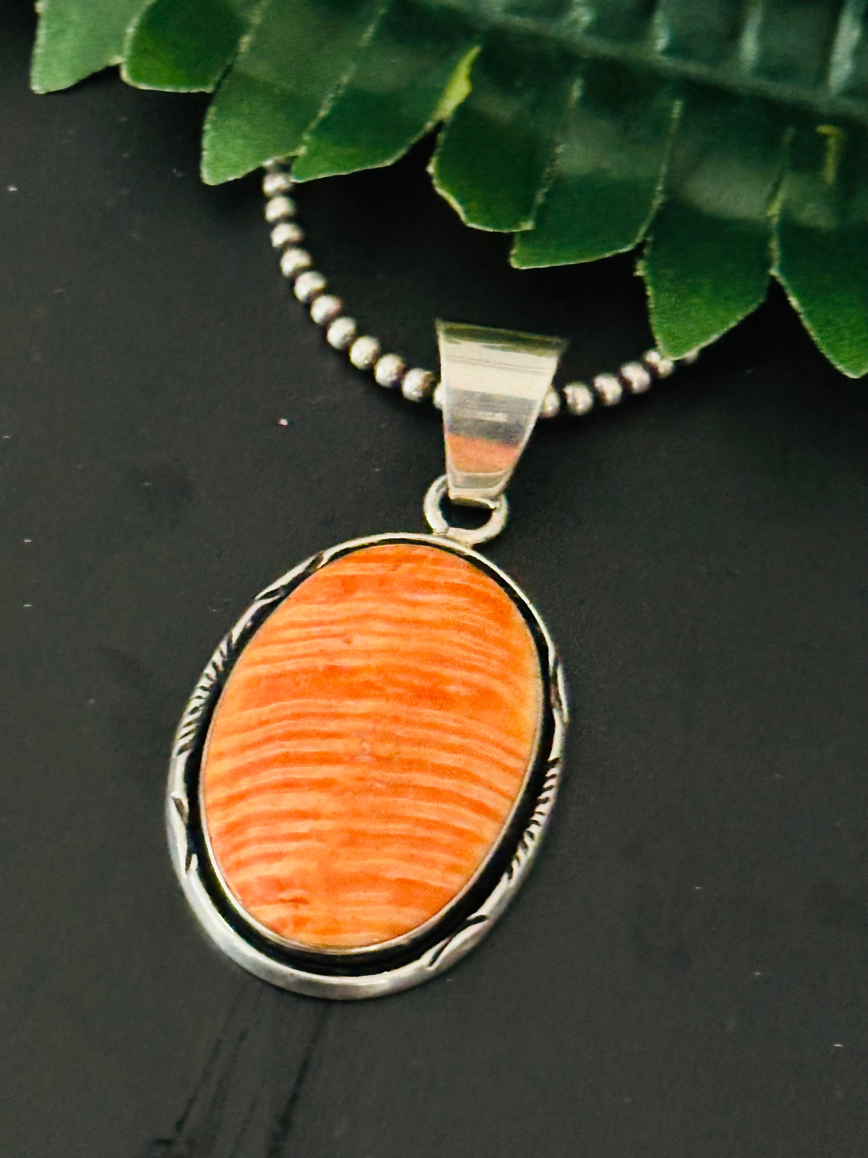 Navajo Made Spiny Oyster & Sterling Silver Pendant