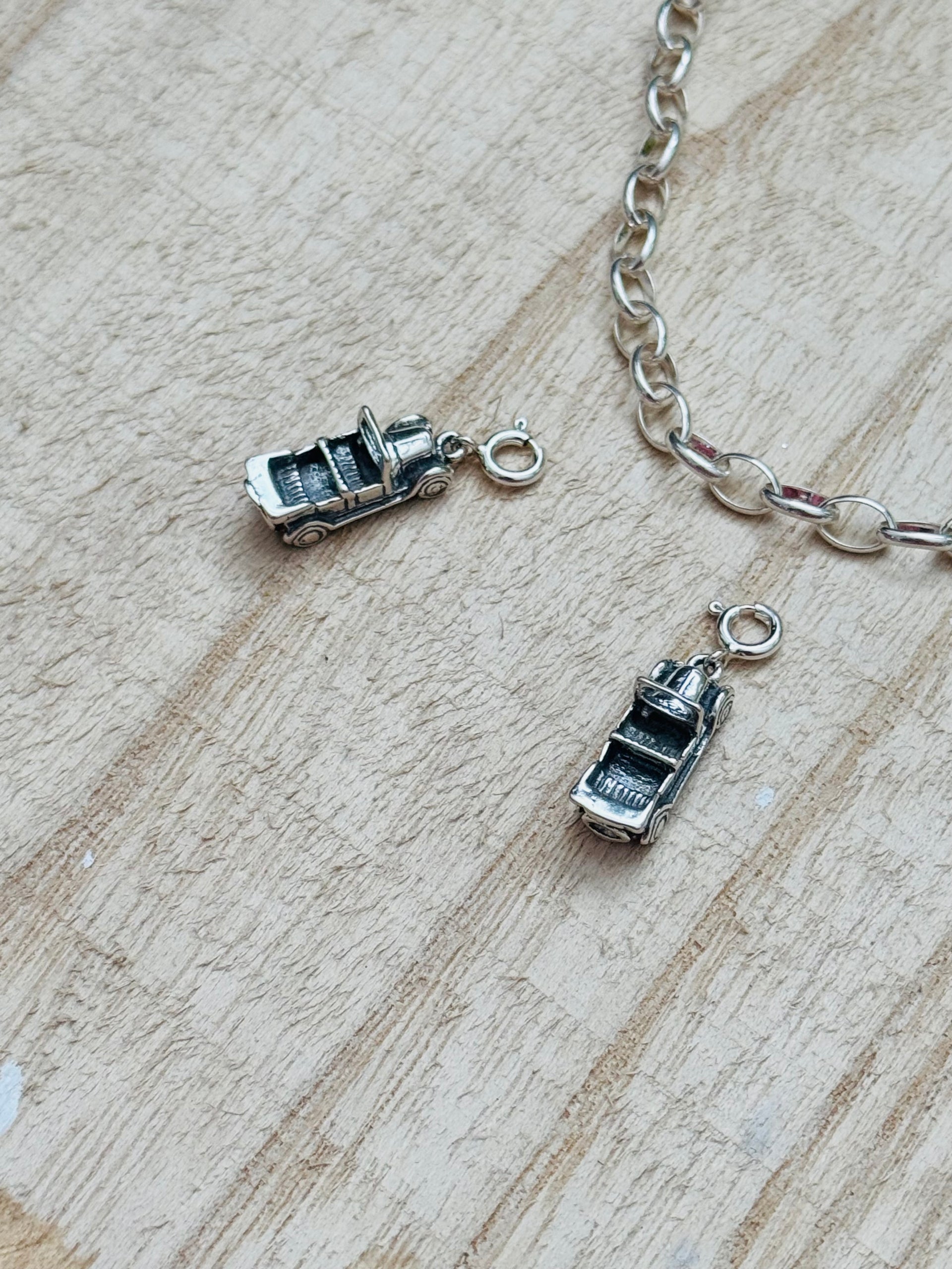 Navajo Made Sterling Silver Car Cast Charms