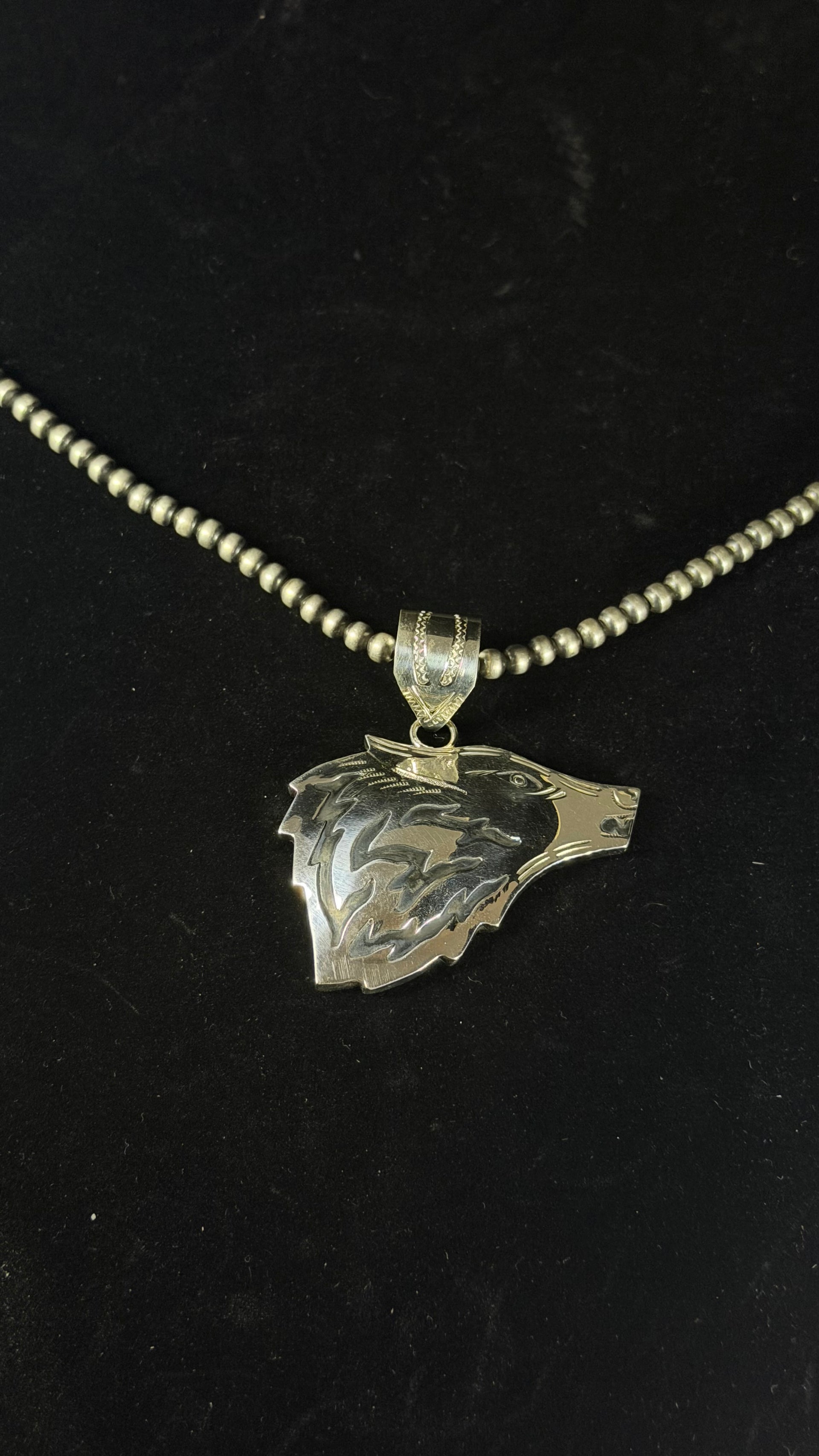 Navajo Made Sterling Silver Wolf Pendant