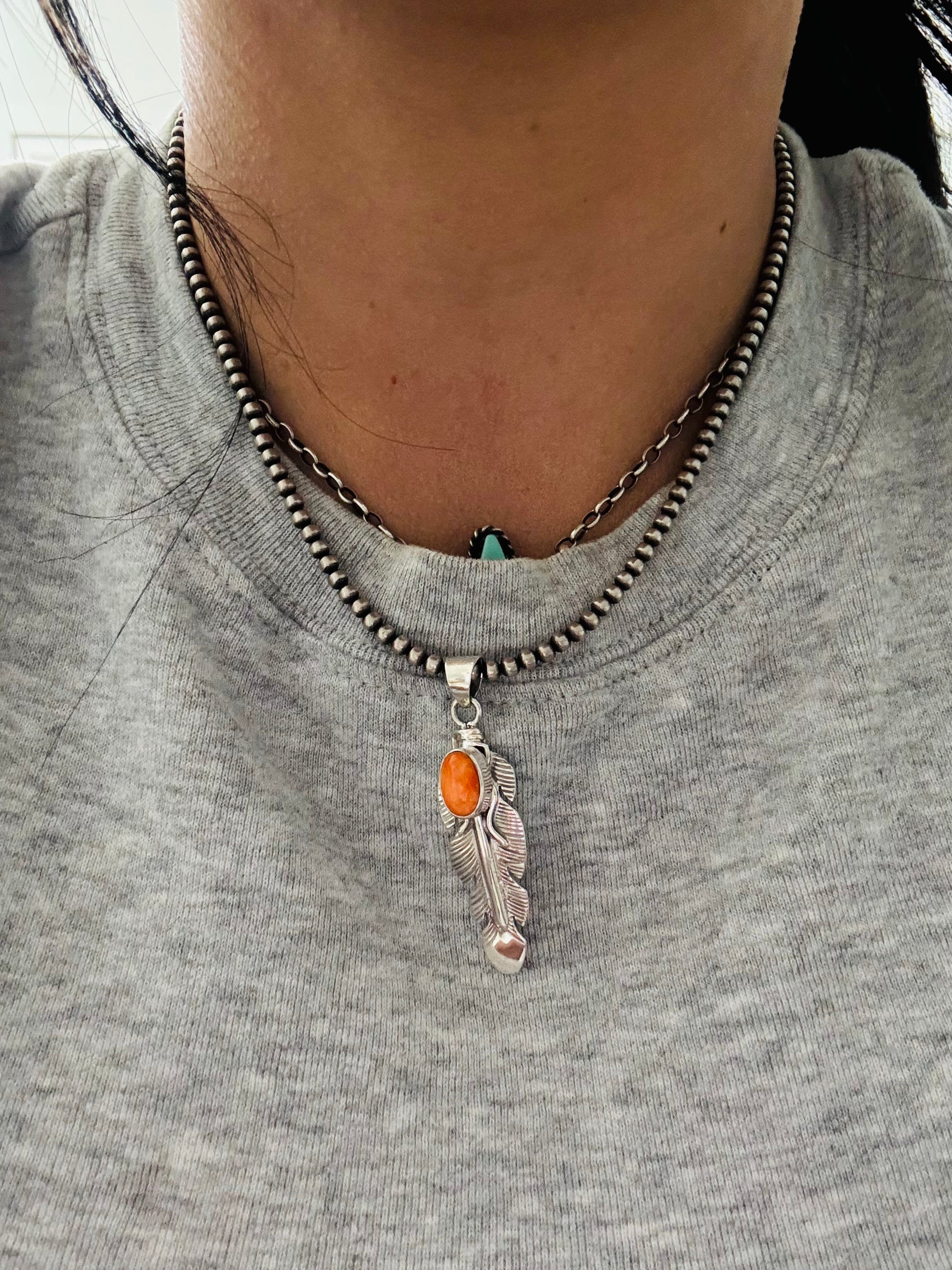 Navajo Made Spiny Oyster & Sterling Silver Feather Pendant