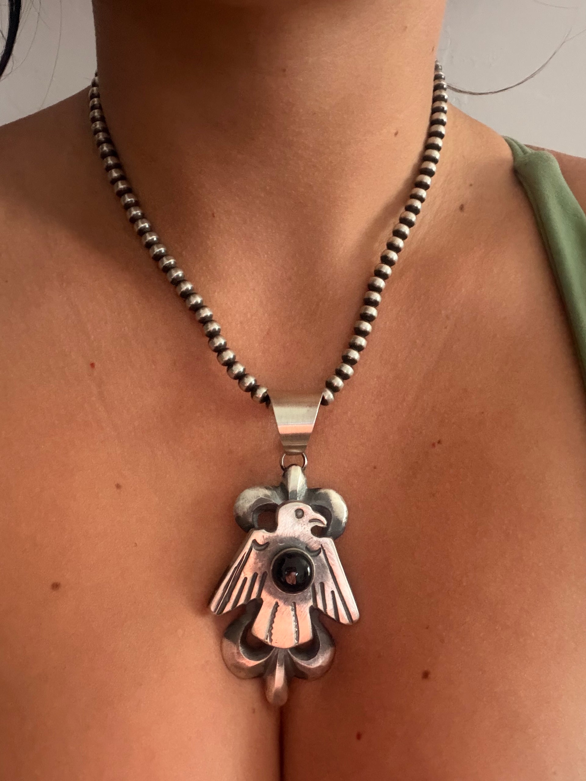 Chimney Butte Onyx & Sterling Silver Thunderbird Pendant