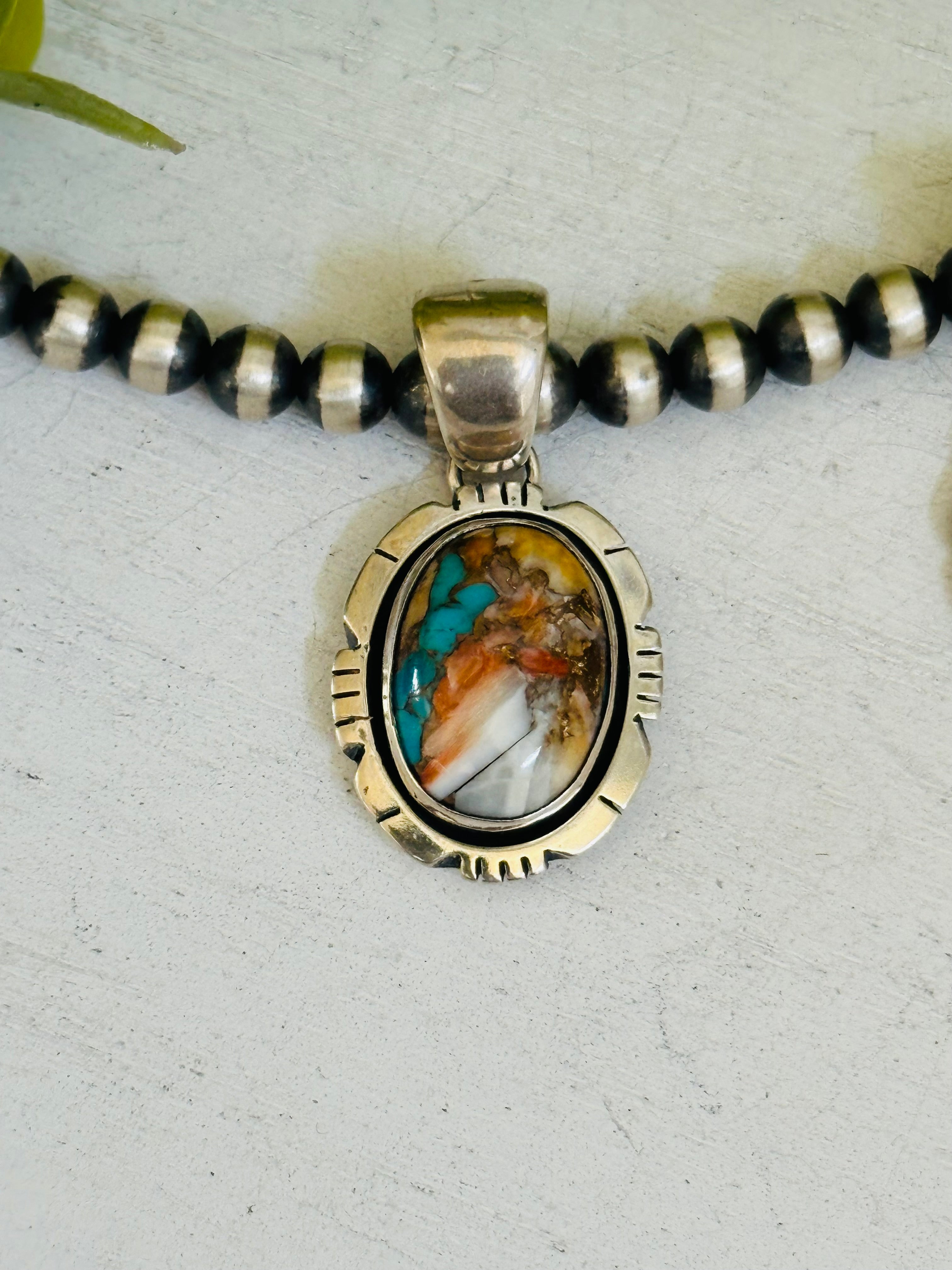 Navajo Made Mohave Turquoise & Sterling Silver Pendant