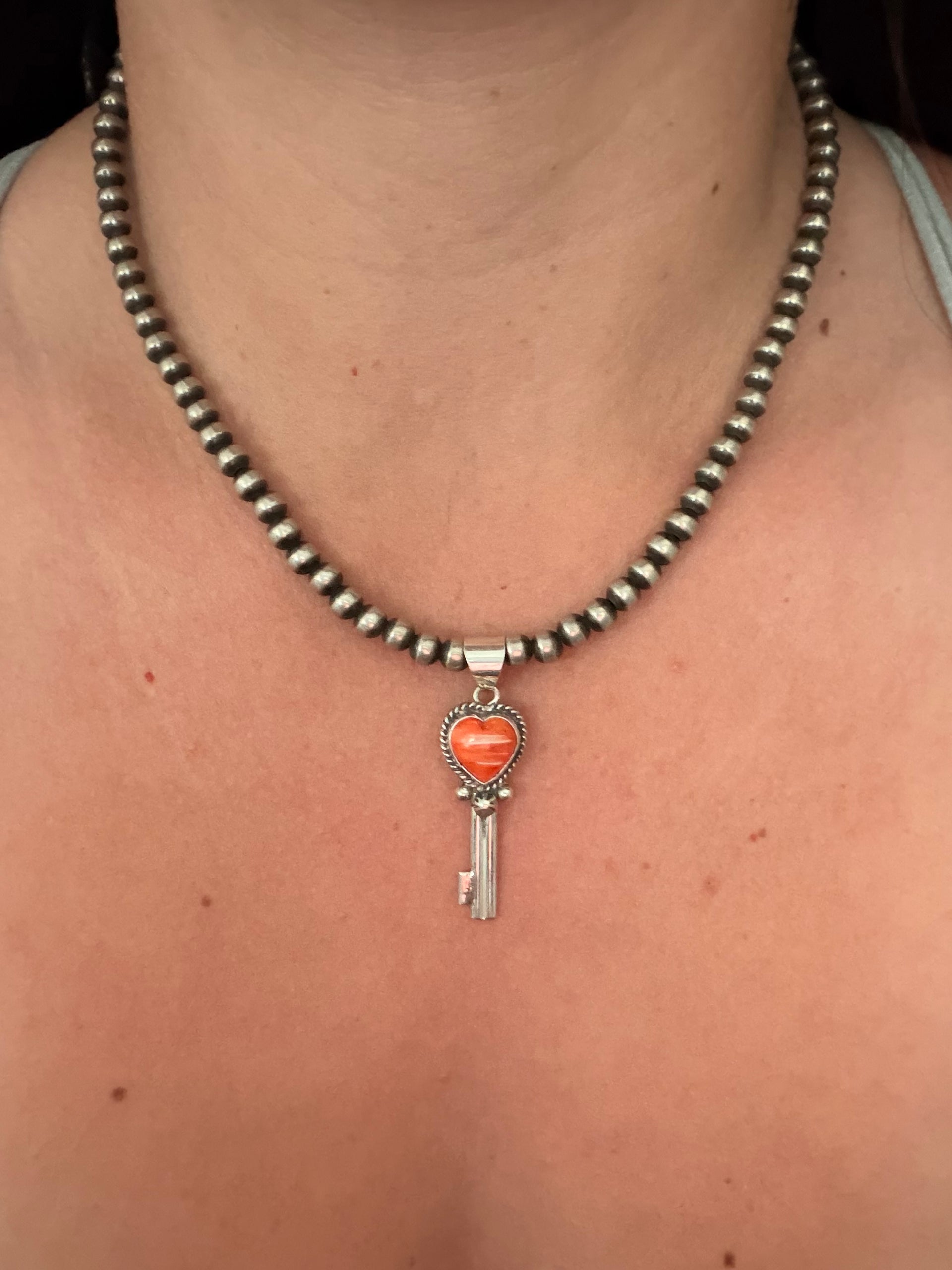 Navajo Made Spiny Oyster & Sterling Silver Pendant