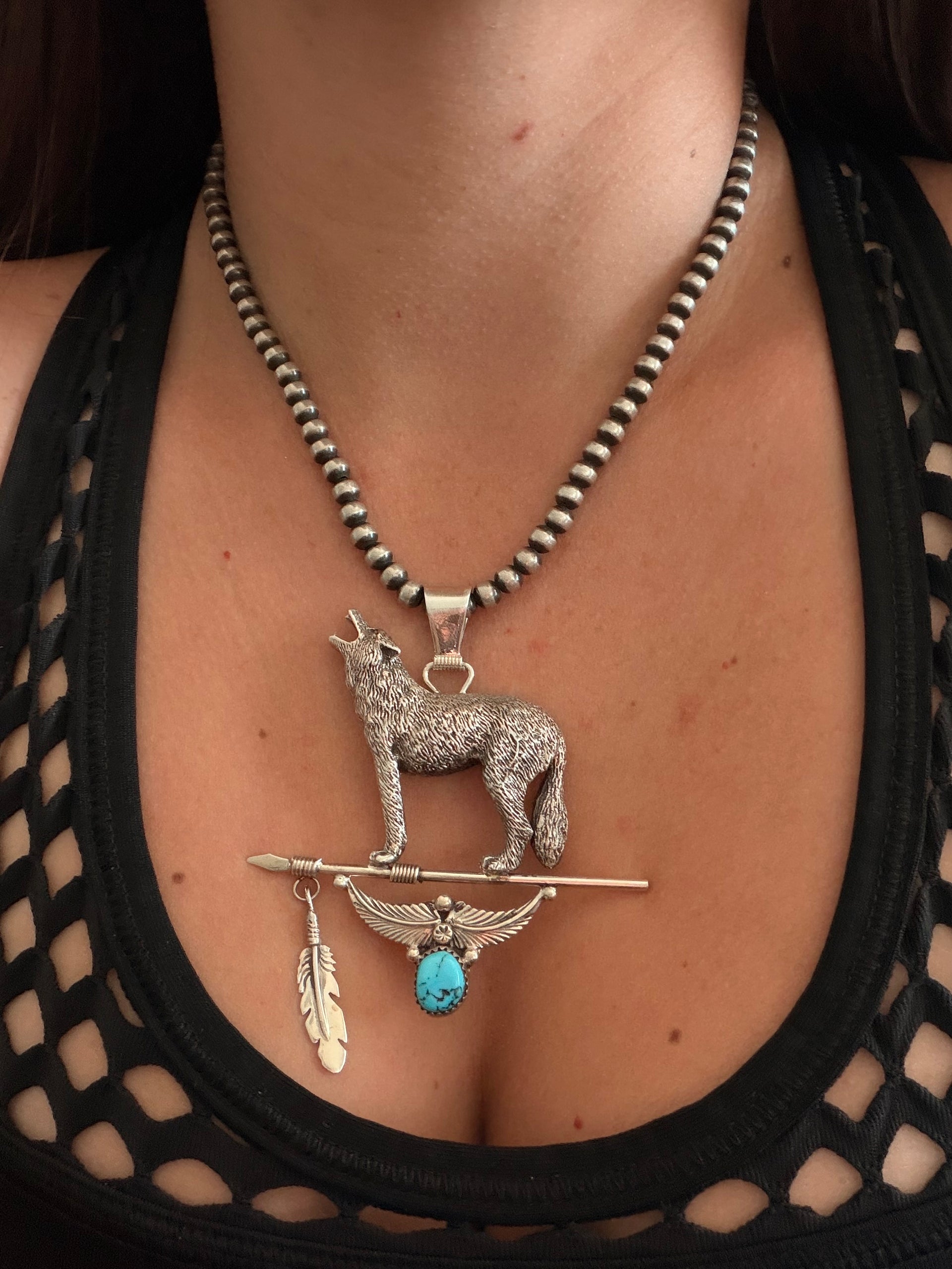 Navajo Made Kingman Turquoise & Sterling Silver Wolf Pendant