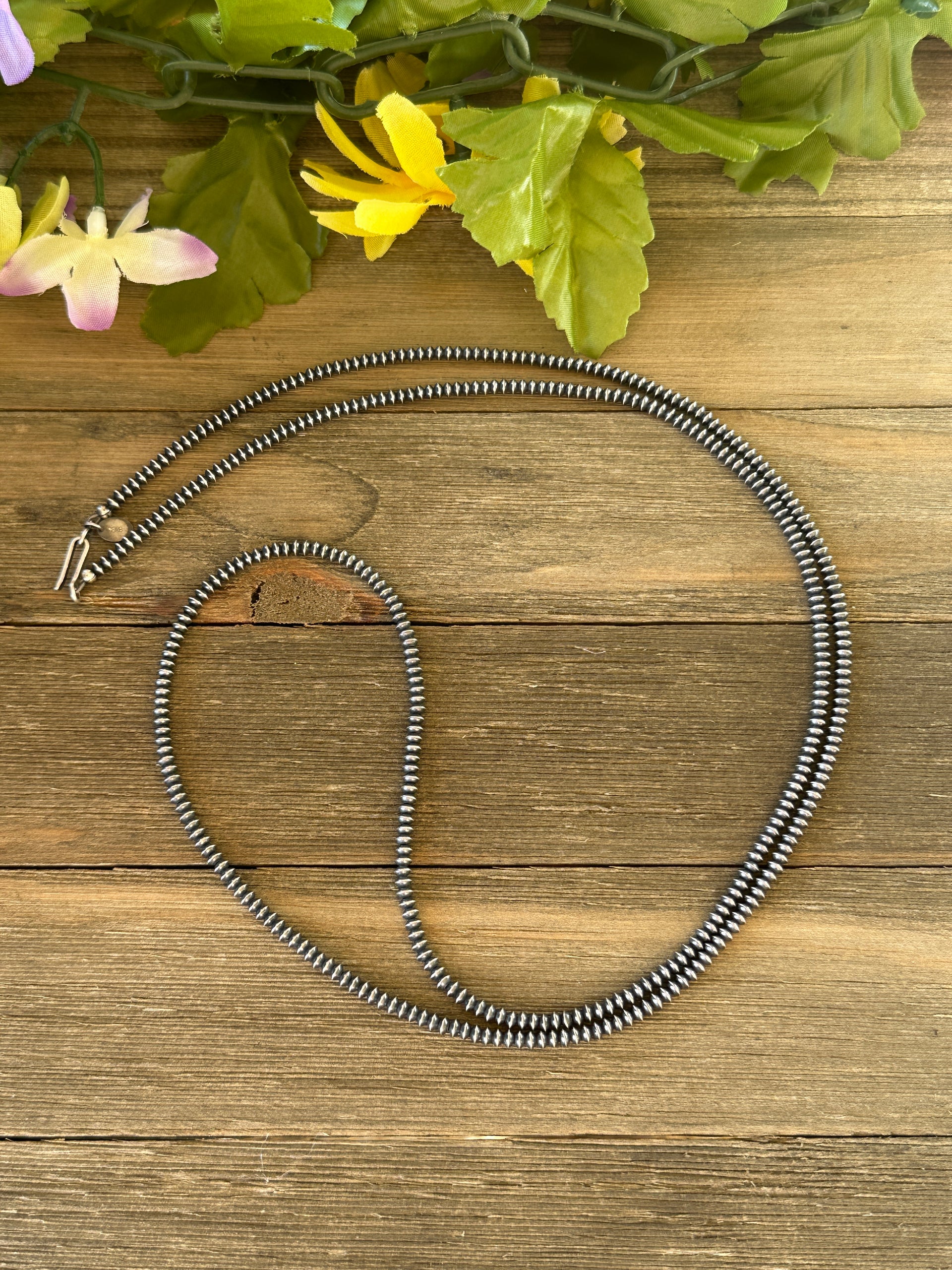 Navajo Strung Sterling Silver 3 MM Saucer Pearl Necklace.