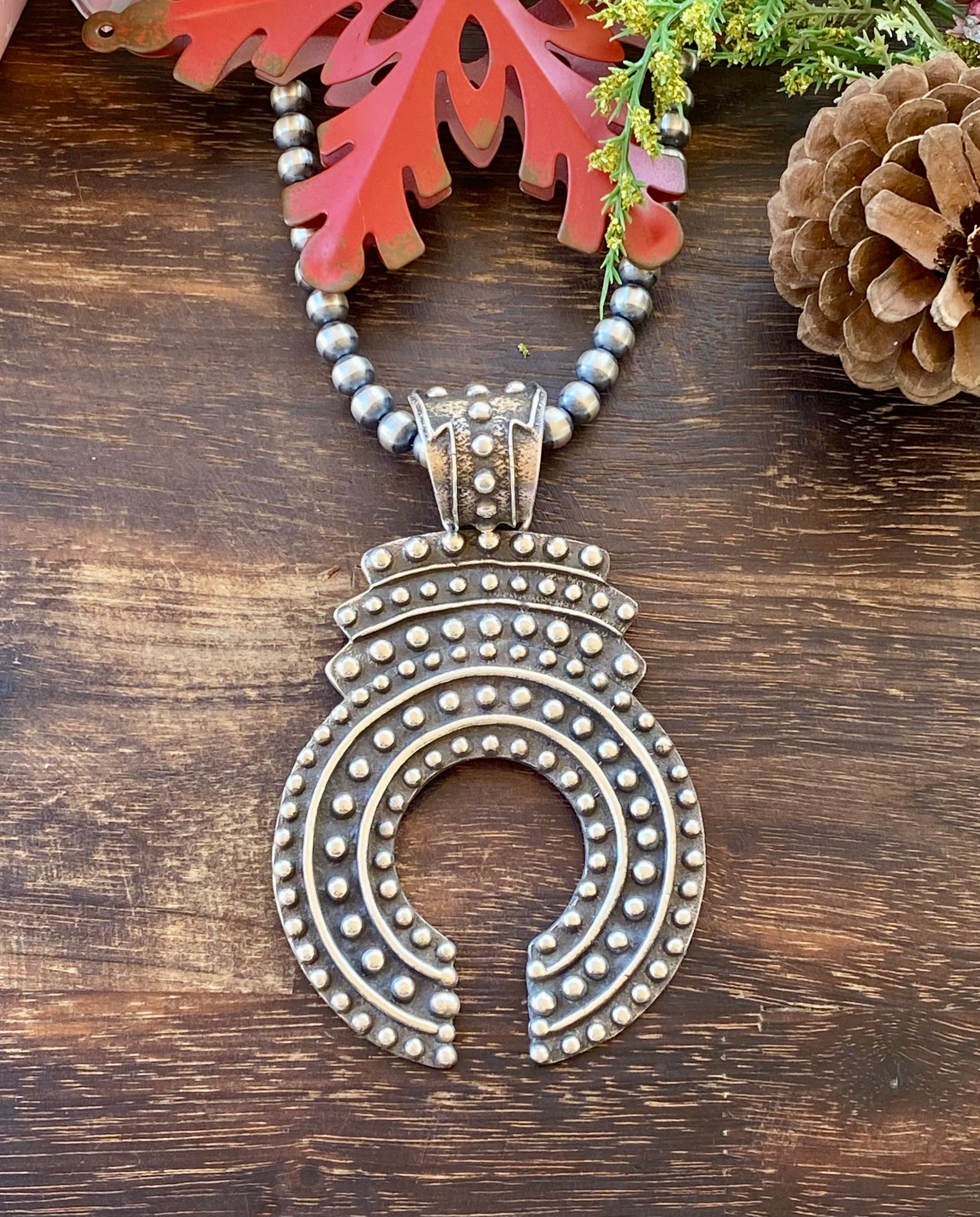 Delbert Arviso Sterling Silver Tufa Cast Naja Pendant